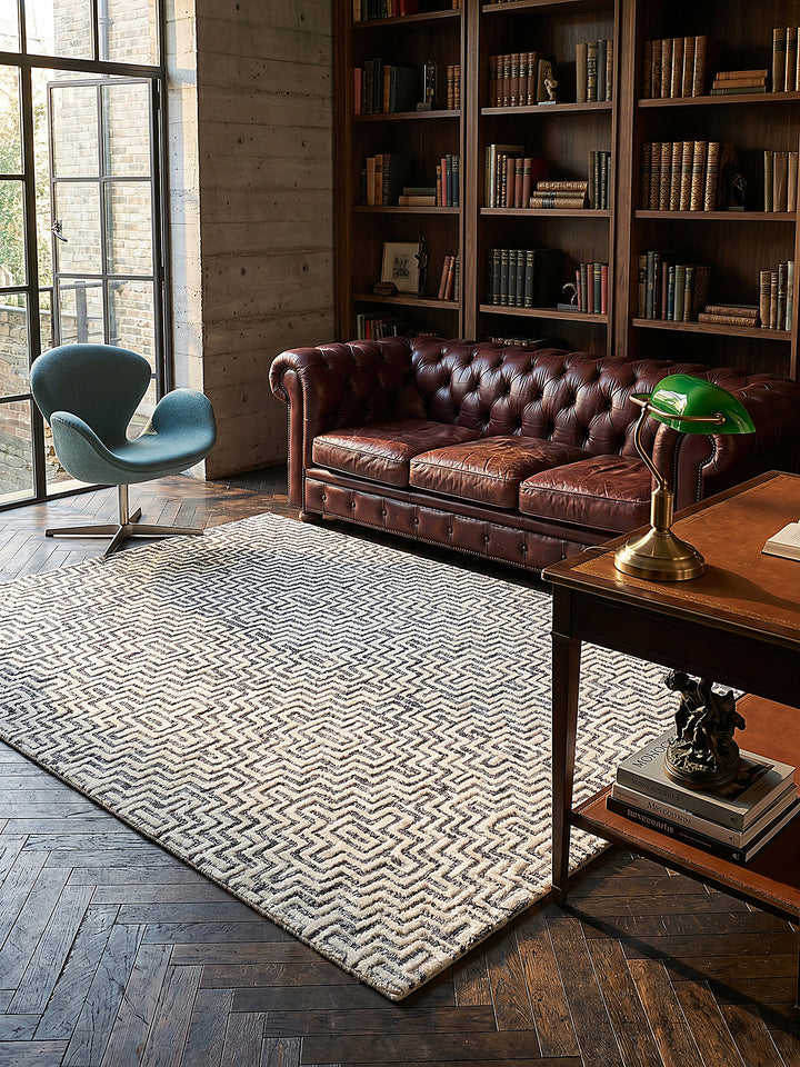Teppich Grau rechteckig im Wohnzimmer mit Couchtisch und Wohnaccessoires Wohnidee skandinavisch modern_