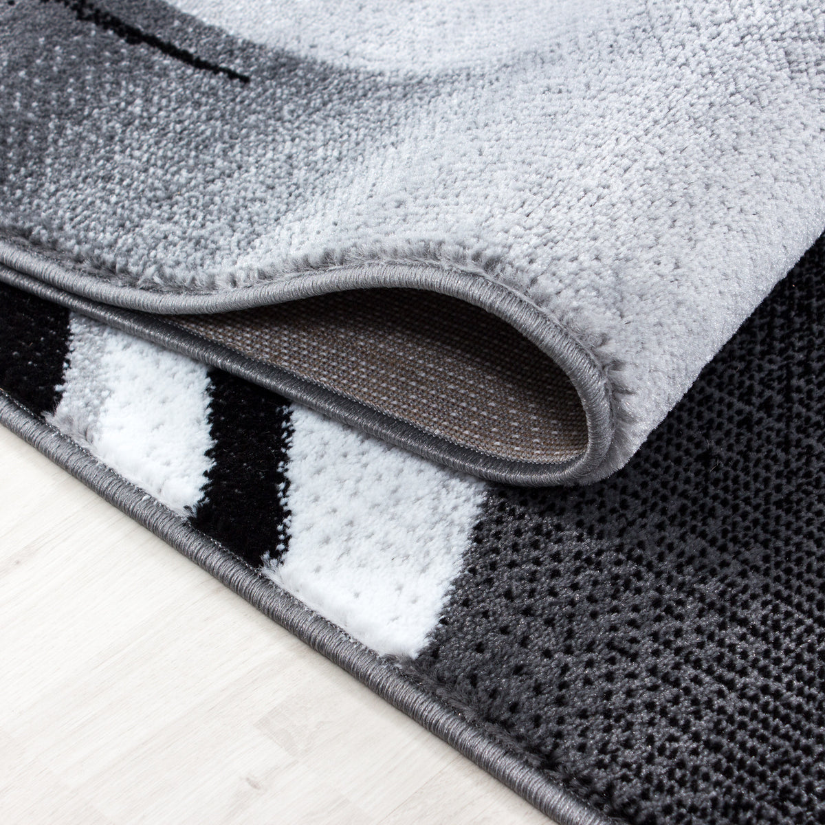 Kurzflor-Teppich Schwunglinien – Waschbar | Dynamisches Wellendesign | Heatset-Veredelung für Wolloptik – Ansicht 5