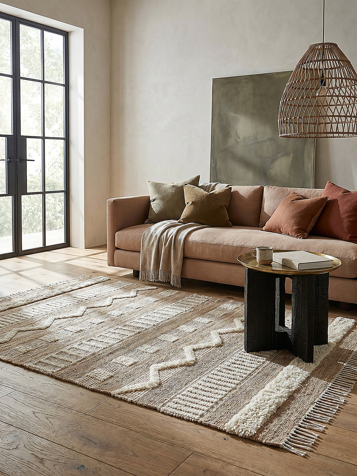 Teppich Natur-Weiß rechteckig im Wohnzimmer mit Couchtisch und Wohnaccessoires Wohnidee skandinavisch modern_