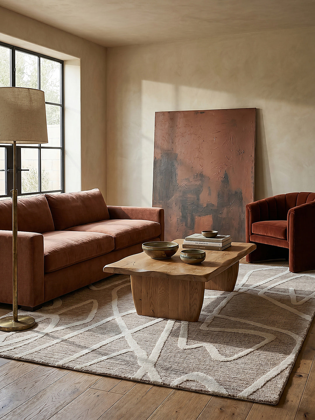 Teppich Taupe rechteckig im Wohnzimmer mit Couchtisch und Wohnaccessoires Wohnidee skandinavisch modern_