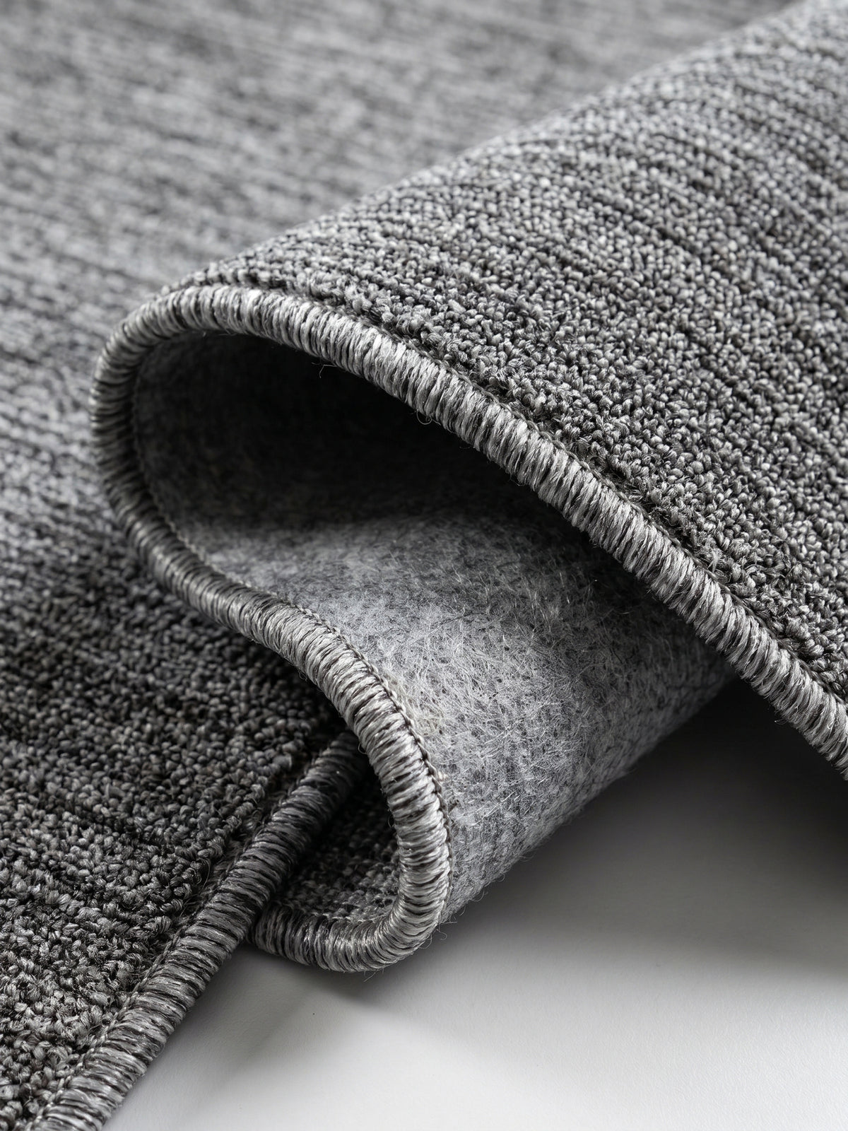 Teppich Grey rund Kante Rückseite_