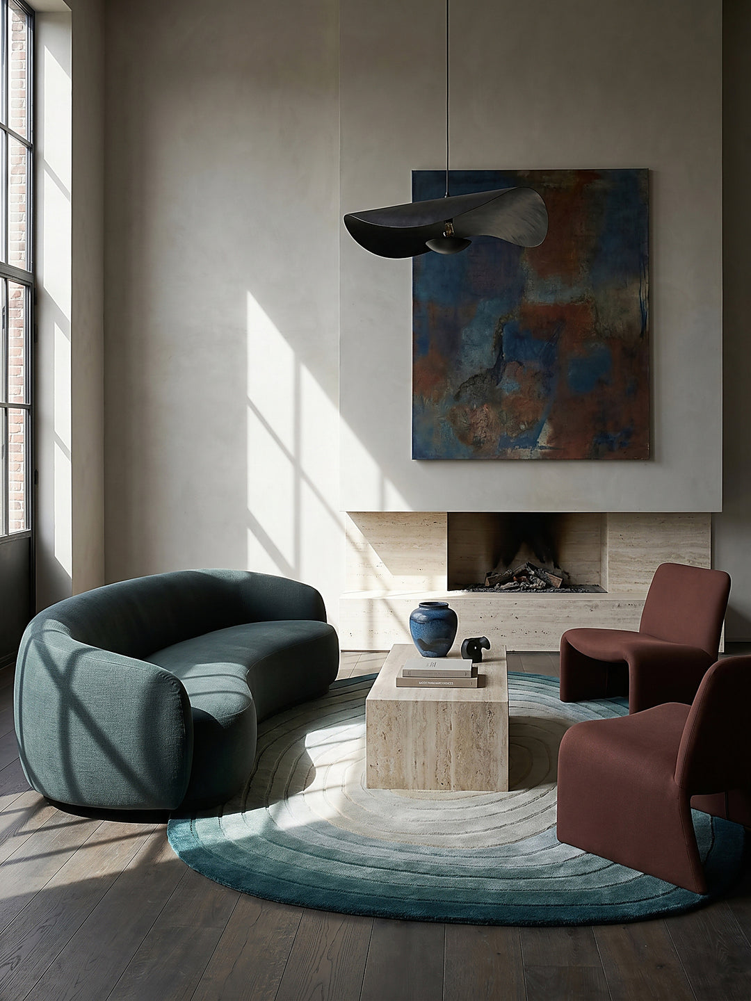Teppich Türkis-Beige oval im Wohnzimmer mit Couchtisch und Wohnaccessoires Wohnidee skandinavisch modern_