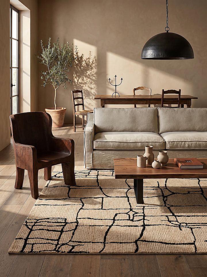 Teppich Creme-Schwarz rechteckig im Wohnzimmer mit Couchtisch und Wohnaccessoires Wohnidee skandinavisch modern_
