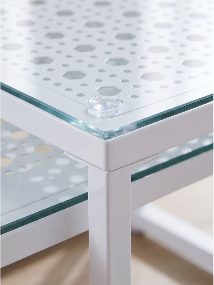 Detailaufnahme der Klarglasplatte auf dem weiß lackierten Metallrahmen mit transparenten Saugnäpfen und perforierter Ablage_