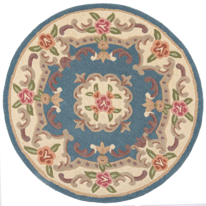 Traditioneller Wollteppich mit handgeschnitzten Details_Blau-Beige_Rund_