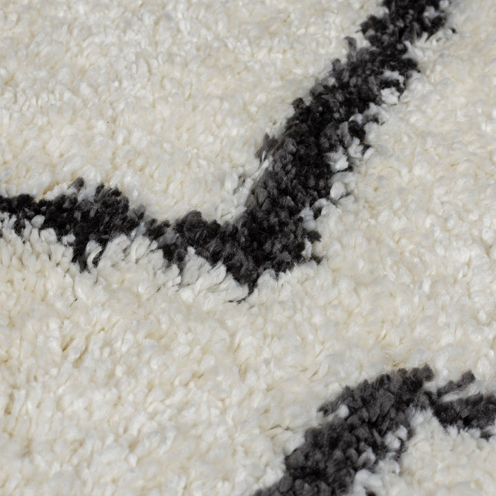 Vielseitiger Hochflor-Teppich in schimmernder Optik_Beige-Schwarz_Rechteckig_