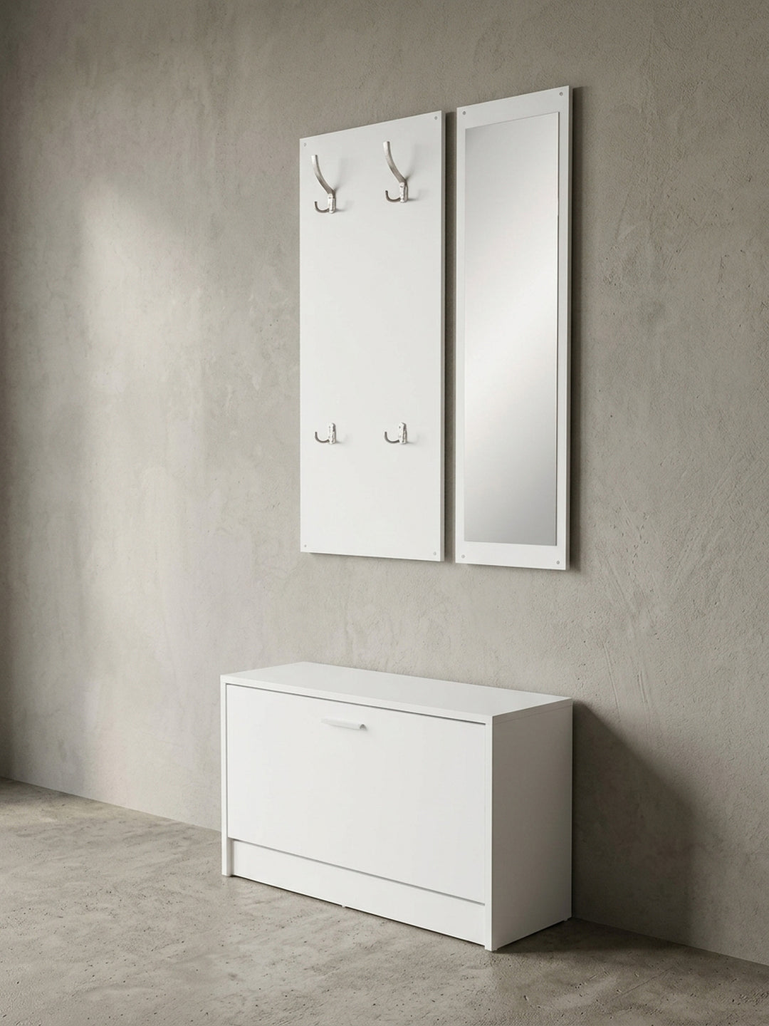 Halbseitige Darstellung der Flurgarderobe Salerno in reinem Weiß mit seitlich montiertem Wandspiegel und freistehendem kleinen Schuhregal_