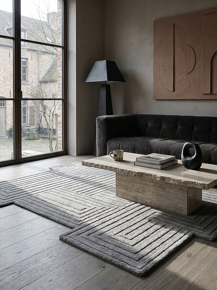 Teppich Grau rechteckig im Wohnzimmer mit Couchtisch und Wohnaccessoires Wohnidee skandinavisch modern_